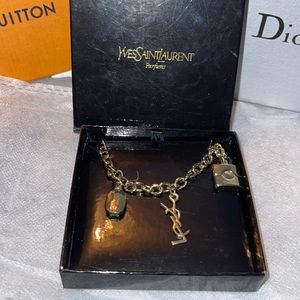 Yves Saint Laurent charm bracelet excellent condition.